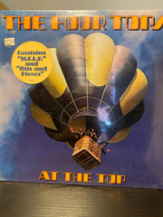 At the top