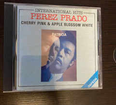 International hits Perez Prado cherry pink & apple blossom white